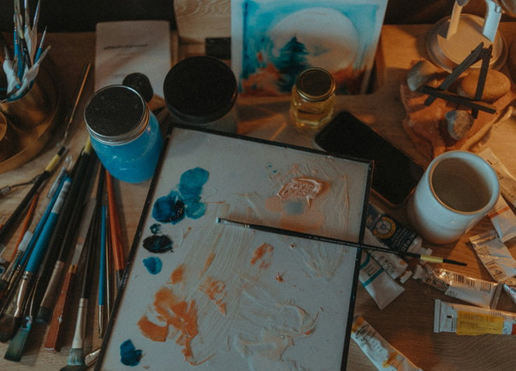 white-and-blue-paint-brush-on-white-paper.jpg white and blue paint brush on white paper